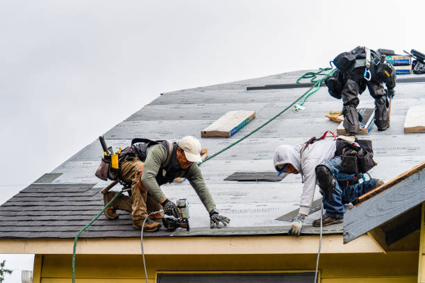 Professional Roofing technician working in Lindenhurst, NY